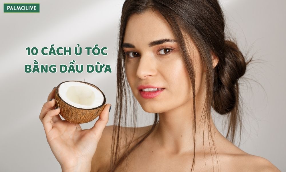 Người phụ nữ có mái tóc dài màu nâu, cột nhẹ phía sau, cầm một nửa quả dừa, phía trên là dòng chữ "10 cách ủ tóc bằng dầu dừa". Logo Palmolive nằm ở góc trên bên trái.